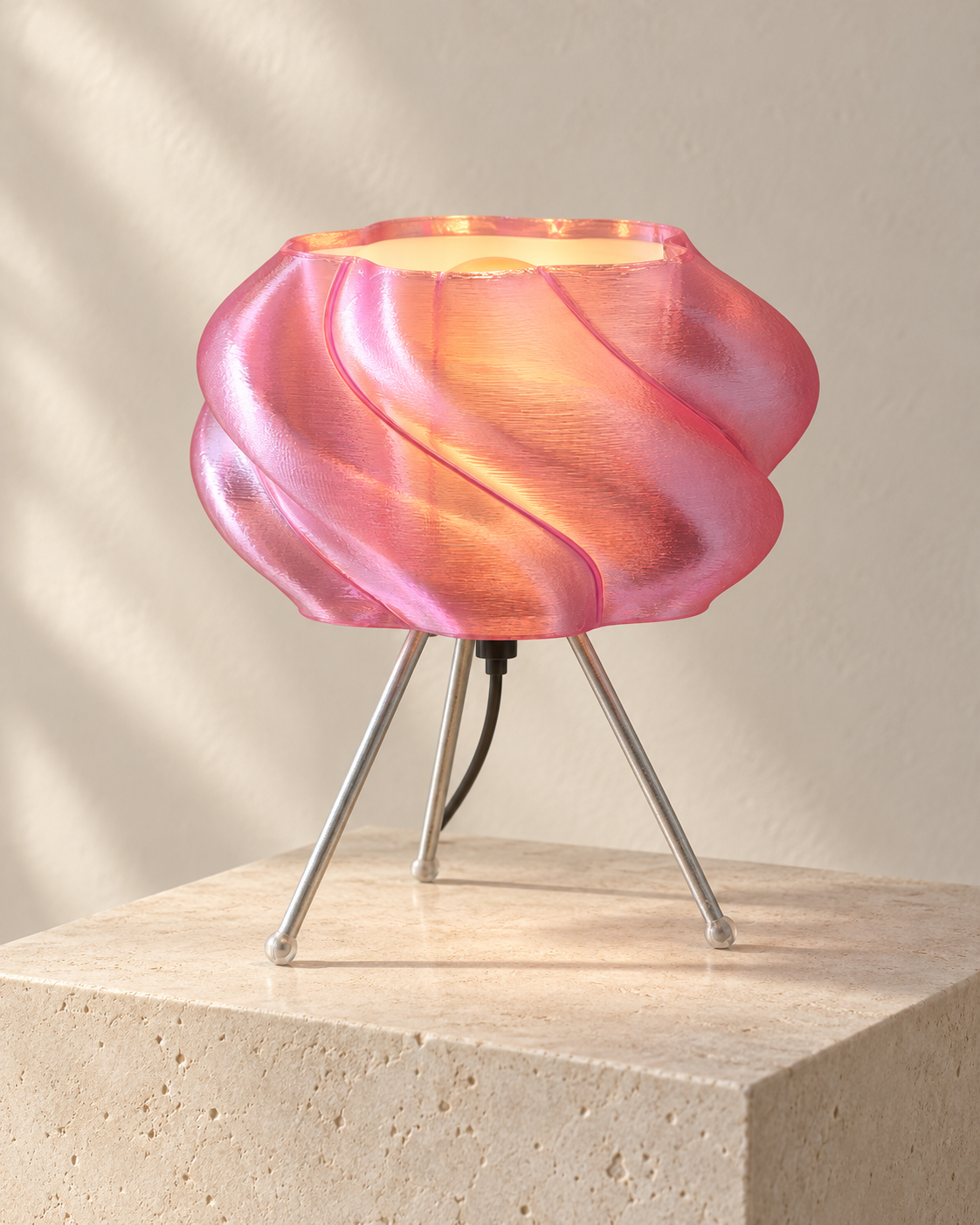 Elio table lamp on a stone plinth